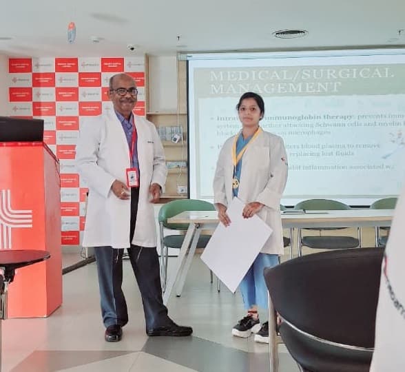 Physiotherapist of Naturopathy Lucknow receiving medal on stage for physiotherapy work by top authority in Physiotherapy